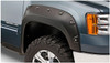 BUSHWACKER 40943-02 BLACK BOSS POCKET/RIVET STYLE SMOOTH FINISH 4-PIECE FENDER FLARE SET FOR 2007-2010 GMC SIERRA 2500 HD/3500 HD (EXCLUDES DUALLY)