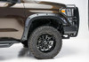 BUSHWACKER 38607-08 BLACK FORGE POCKET/RIVET TEXTURED FINISH 4-PC FENDER FLARE SET FOR 14-21 TOYOTA TUNDRA