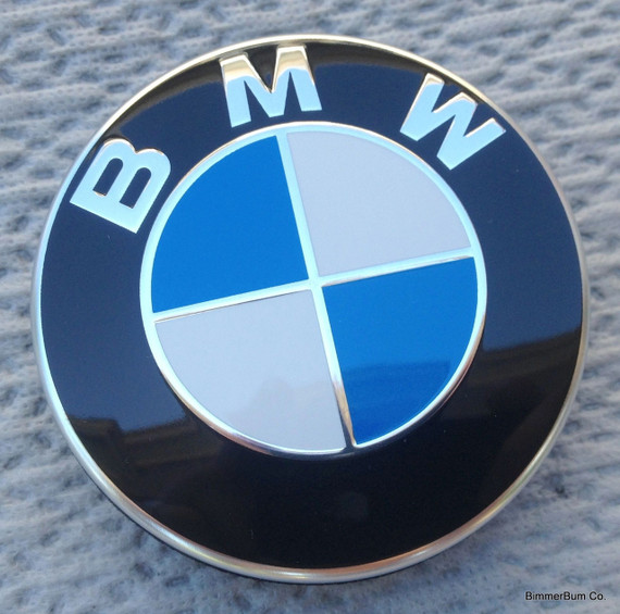 Front view of a 56mm Genuine BMW Roundel wheel center cap part number 36136850834 for G-chassis vehicles.