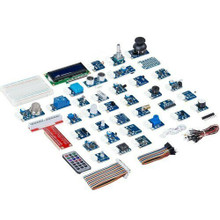 Complete 37-in-1 Raspberry Pi sensor kit with modules, LCD display, remote control, breadboard, and jumper wires laid out.
