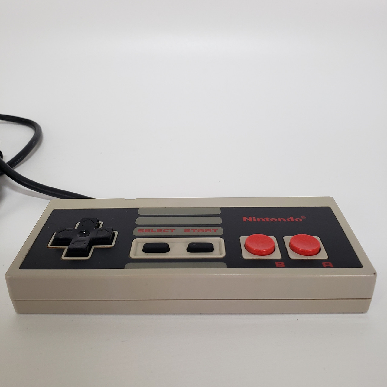 The Nintendo Entertainment System (NES), an 8-bit third-generation home  video game console produced by Nintendo. NES Control Deck home video game  console with controllers. Stock Photo