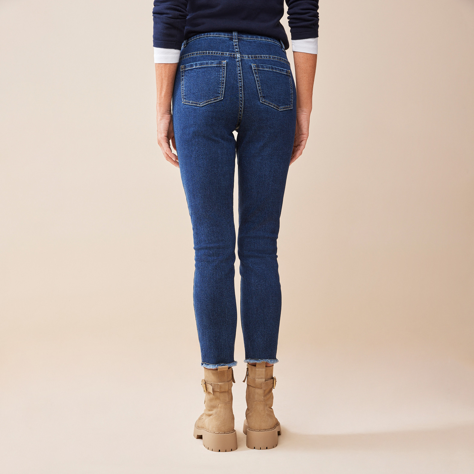 High Rise Raw Hem Jeans Back View