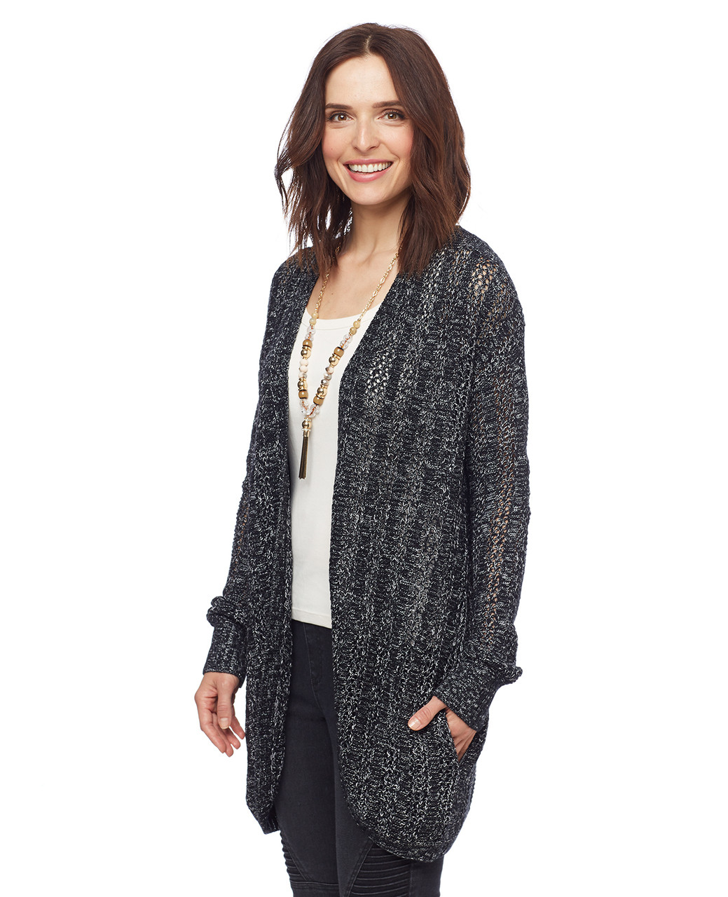 Woman in black open front cocoon cardigan