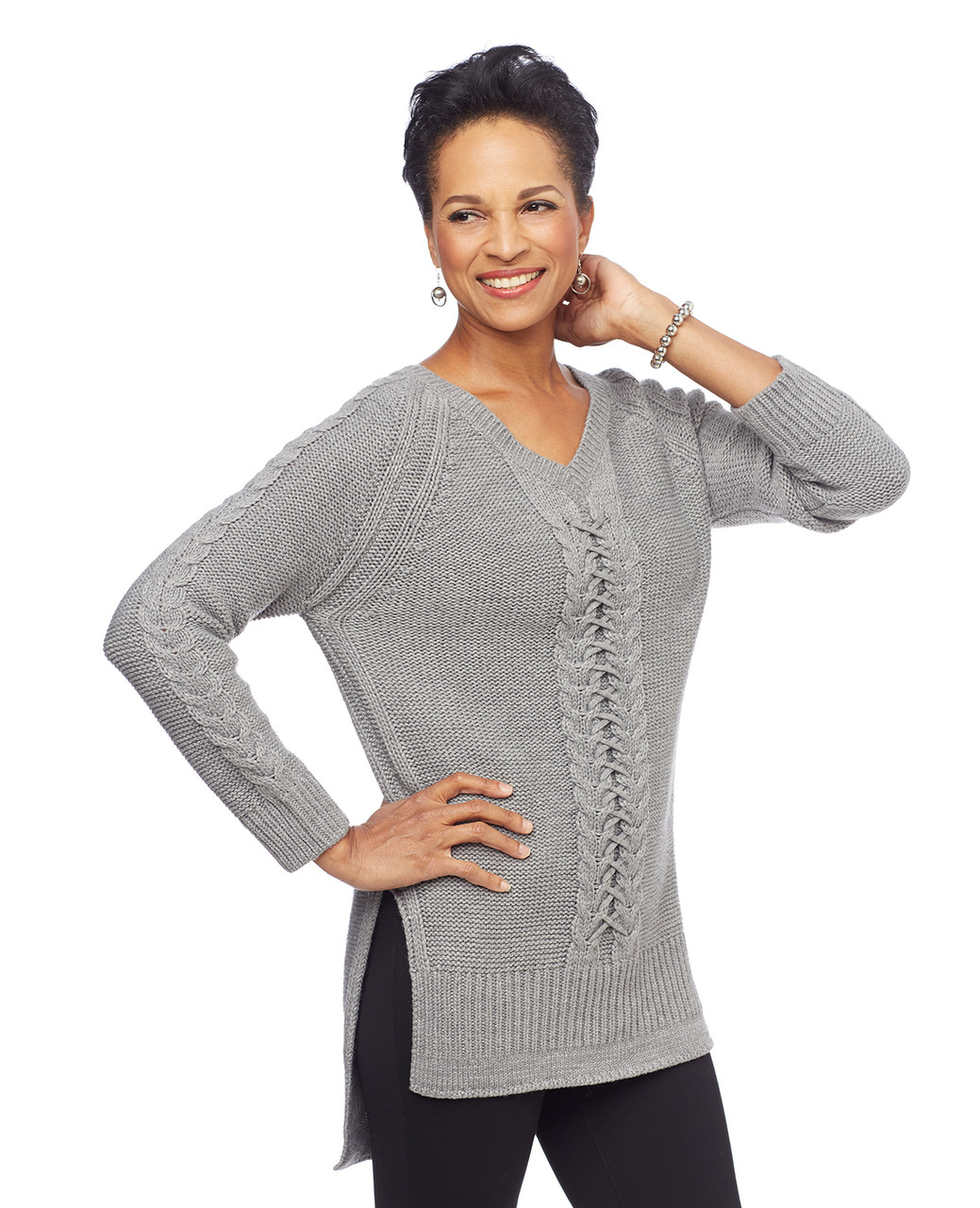 Woman in grey raglan V neck sweater