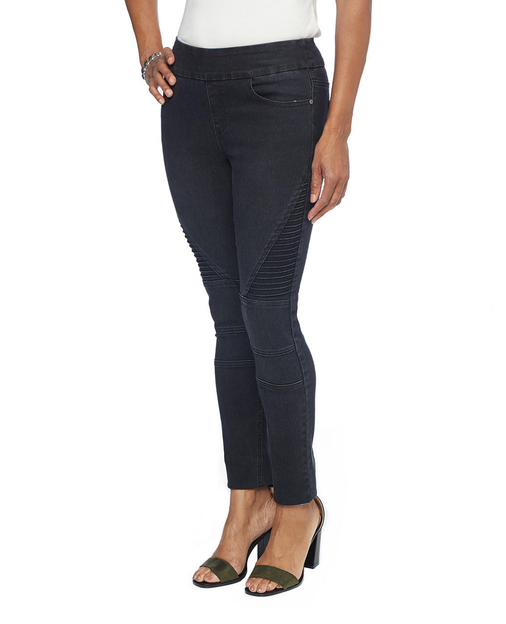 Woman in black skinny moto jeggings