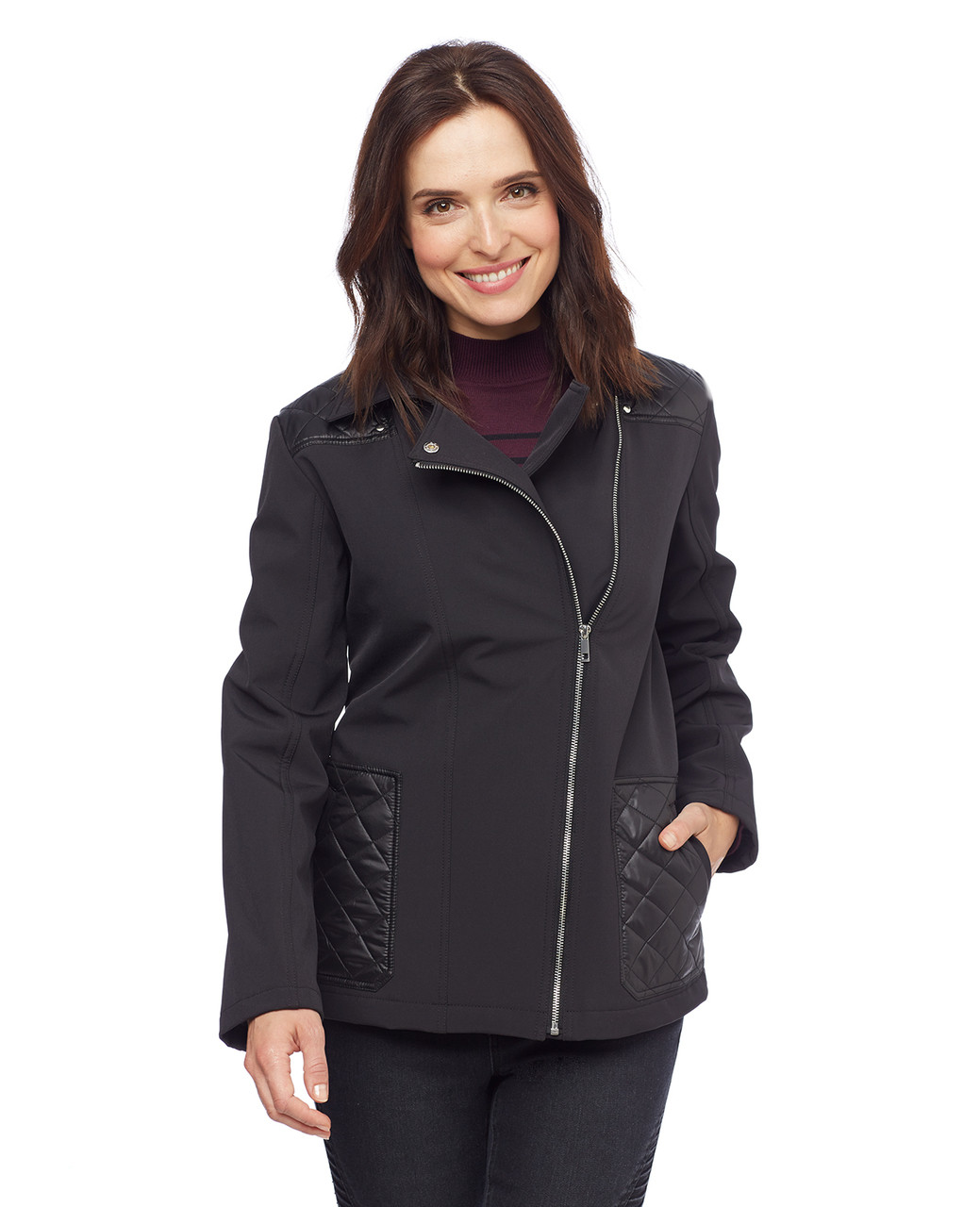 Woman in black quilted asymmetrical jacket