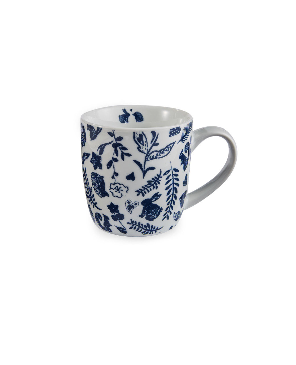 White coffee mug with navy printed woodland creatures