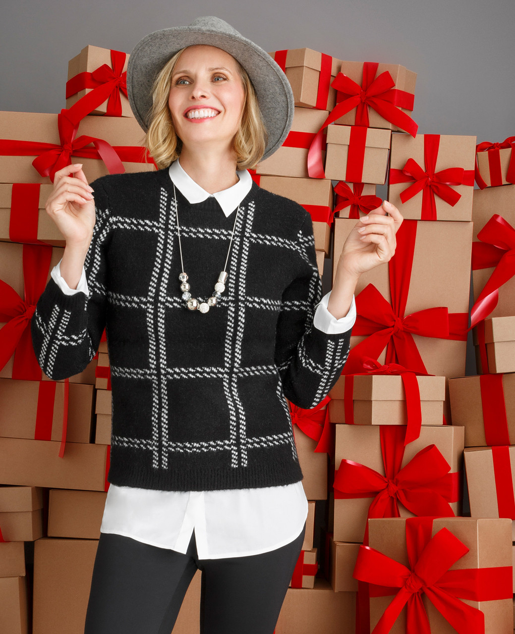 Woman's black plaid mock neck sweater