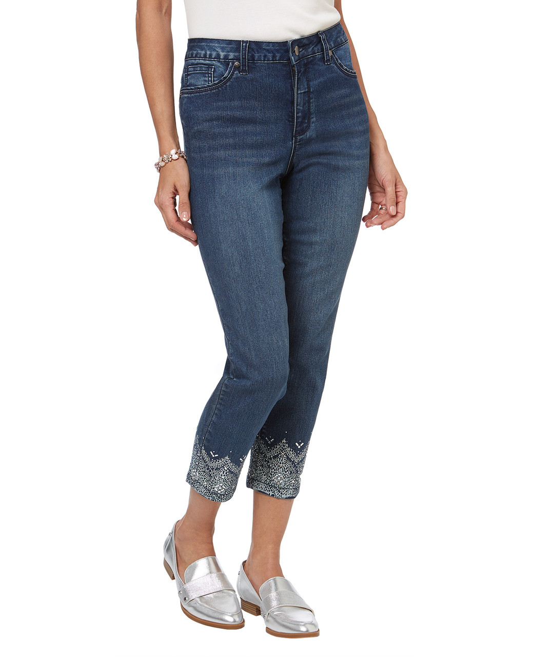 Women's cropped jeans with rhinestone embellished hem.