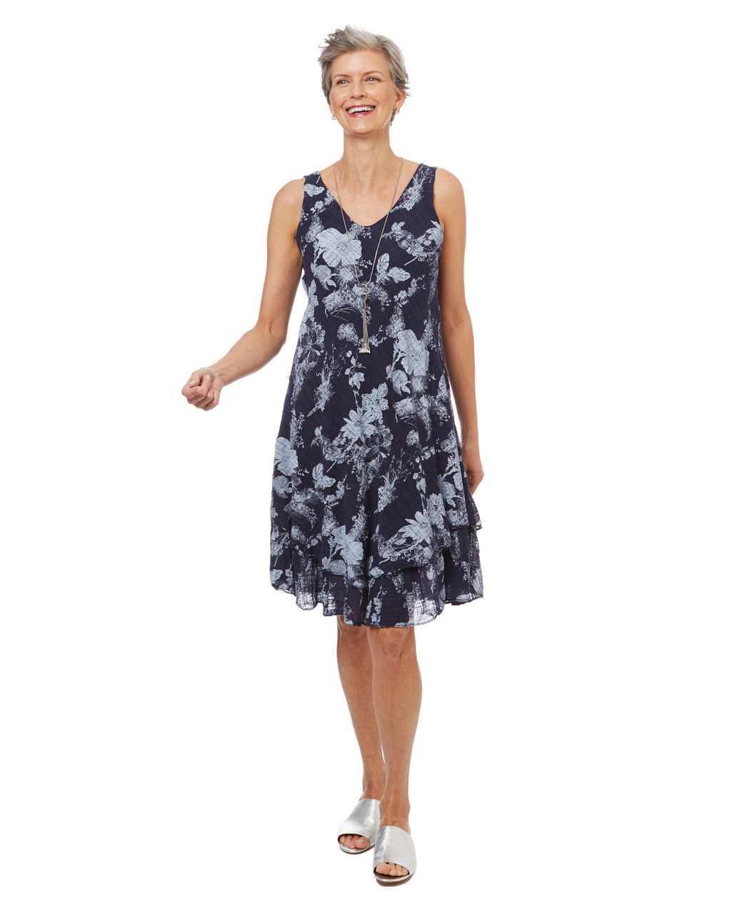 Women's flowy a line dress in a navy floral print.