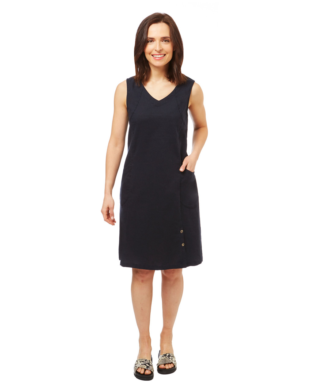 Women's sleeveless v neck linen dress with large pockets.