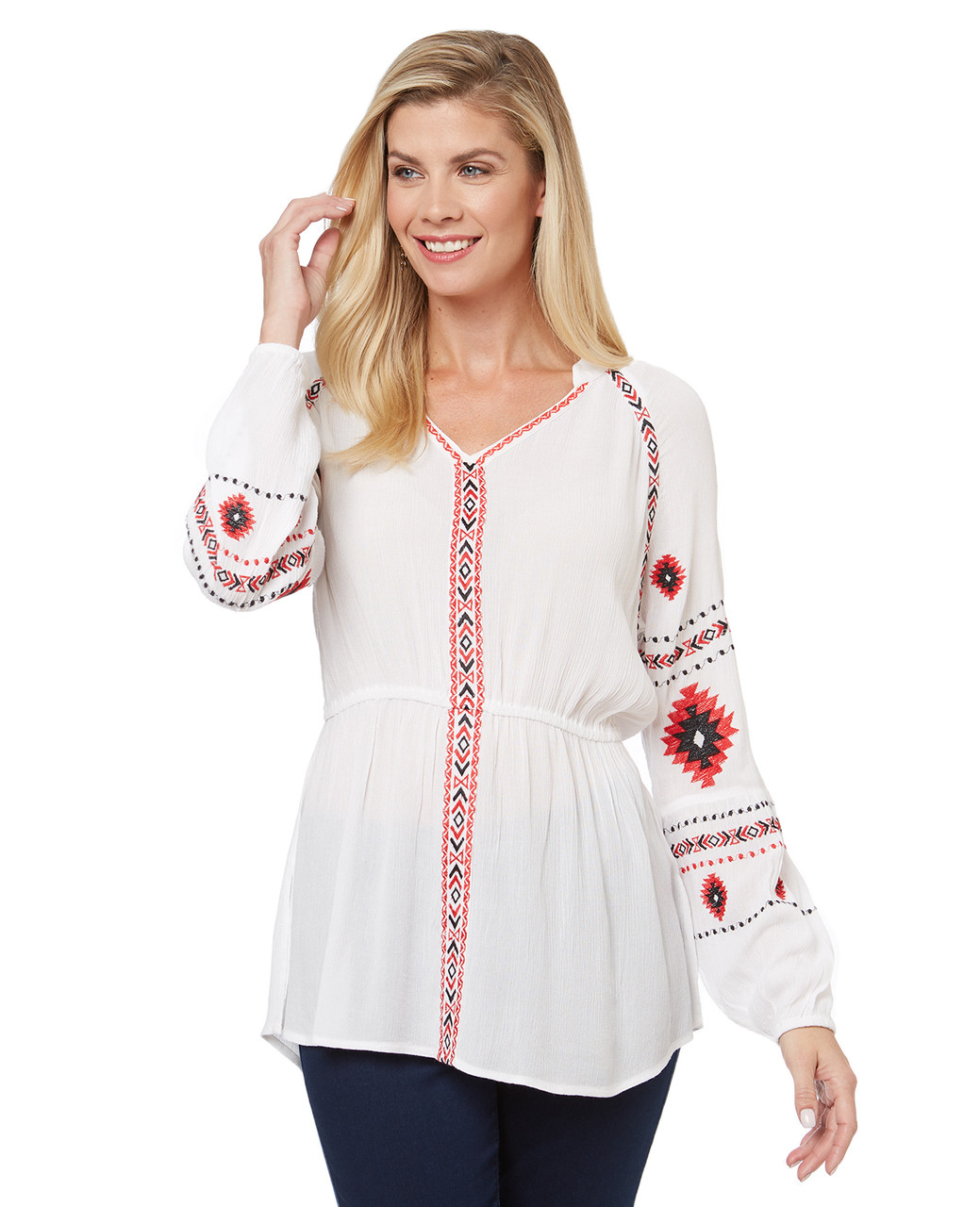 Women's aztec print blouse is embroidered on a flowy crinkle fabric.