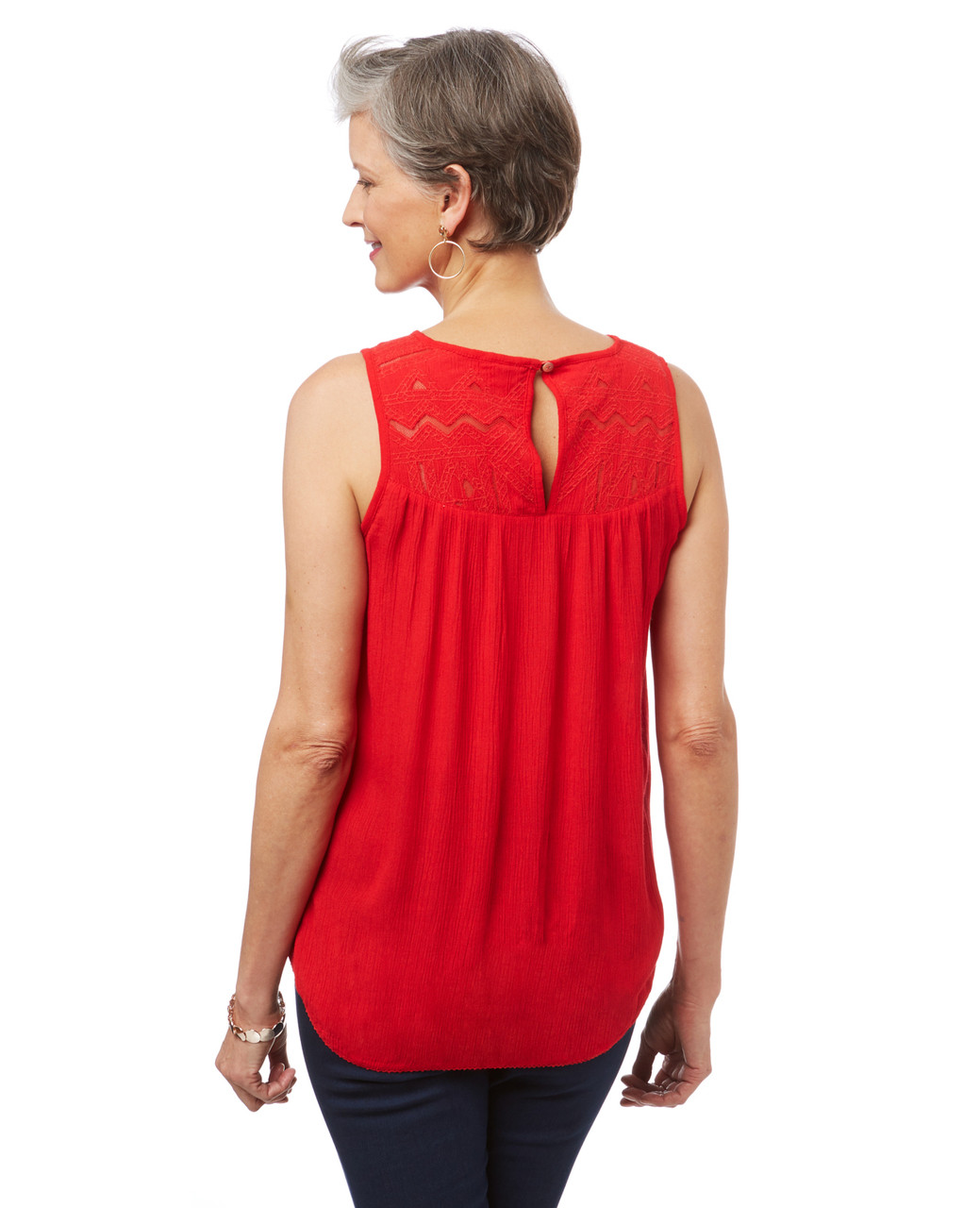 Women's sleeveless embroidered top in crinkle fabric.