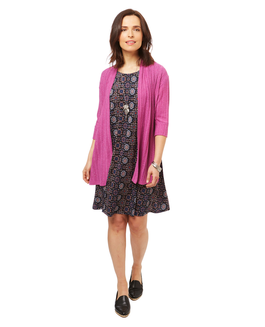 Women's short sleeve boho swing dress in a black geometric print.