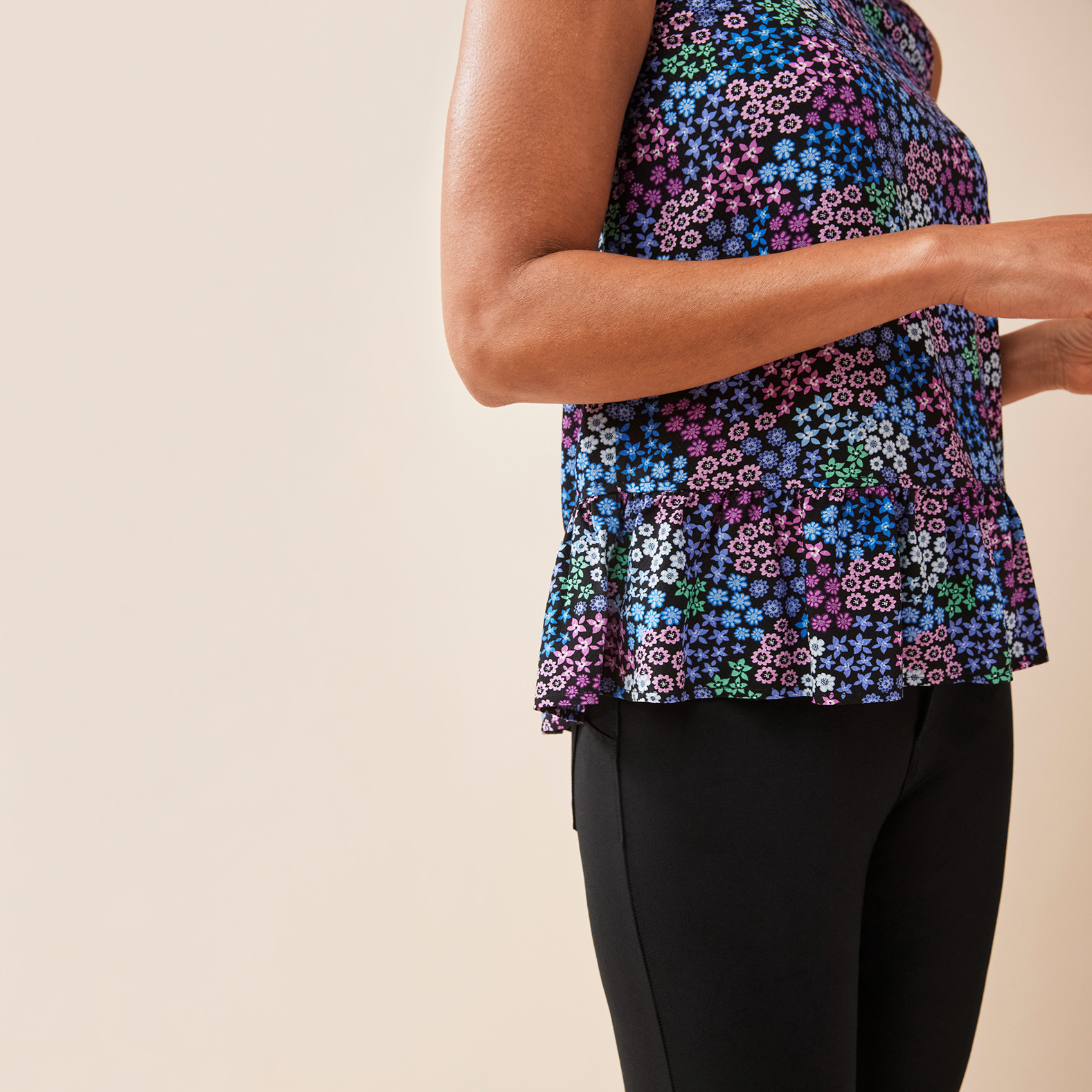 Sleeveless Peplum Top Close Up