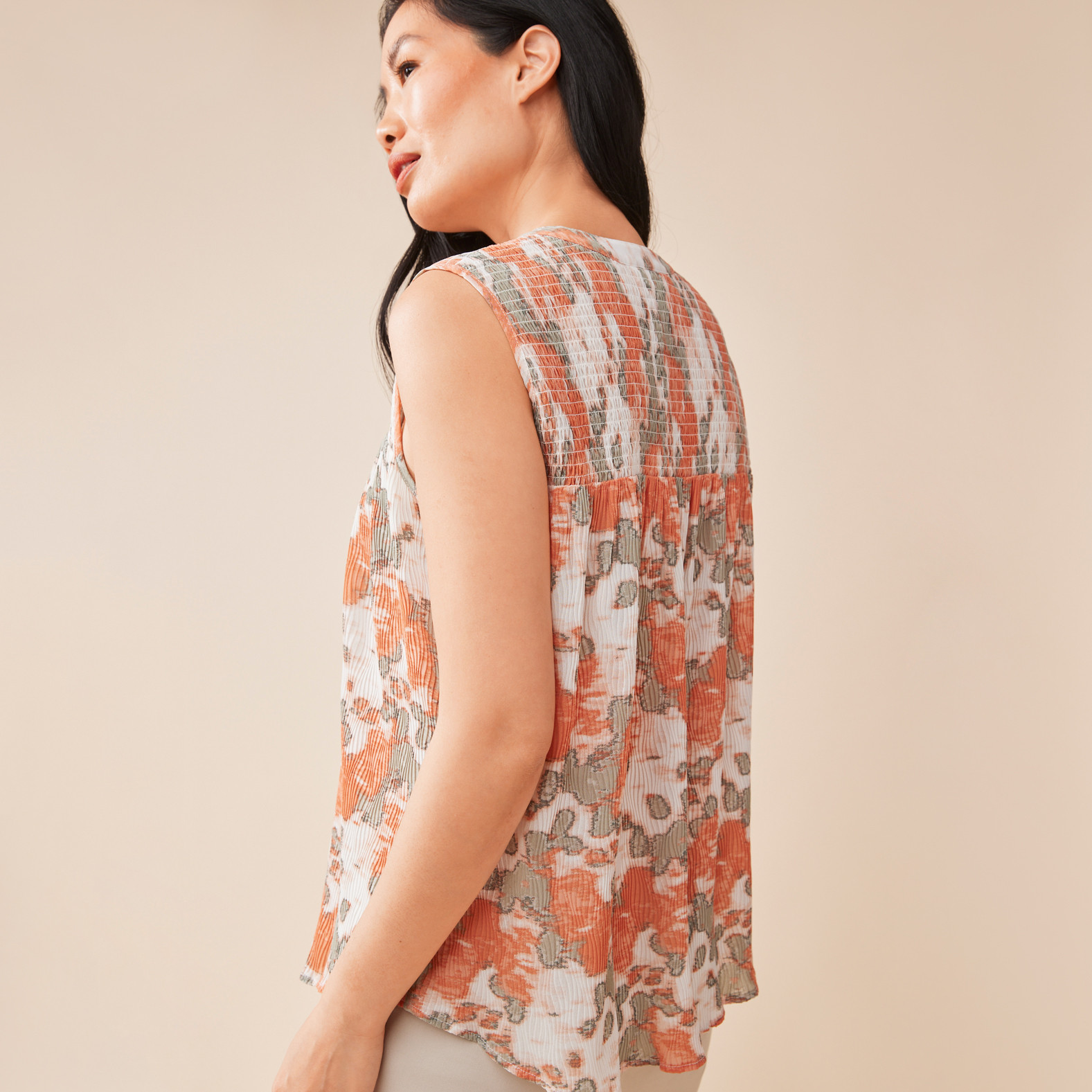 Sleeveless Pleated Blouse Half Body Back View