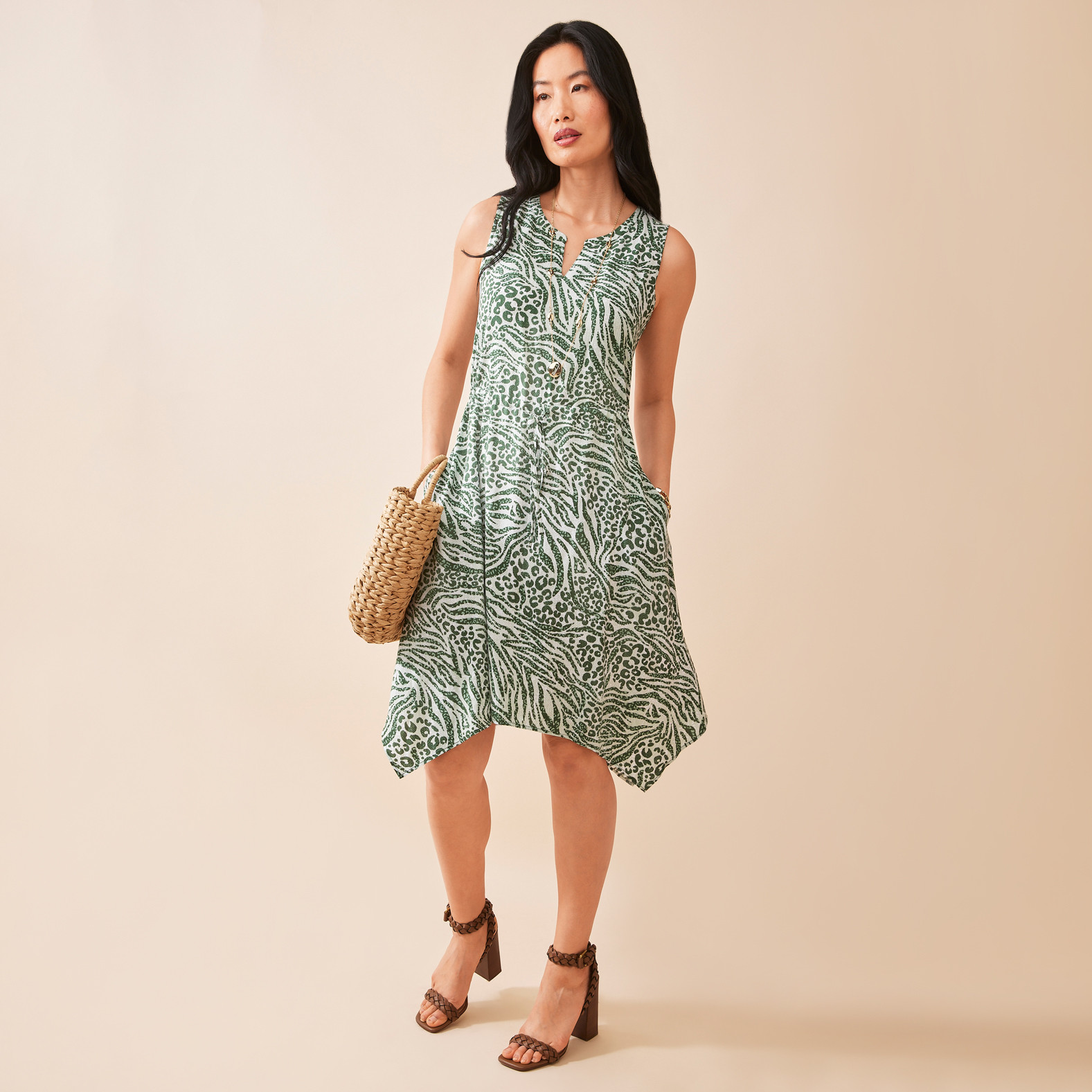 Sleeveless Sharkbite Dress