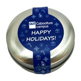 A round, silver candle tin featuring a blue label with festive designs and a holiday greeting.