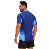 A blue and light blue crew neck raglan tee shirt, featuring short sleeves and a logo.