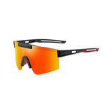 Frameless sports sunglasses featuring a black frame and vibrant orange-tinted lenses. Includes a logo on the frame.