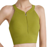 A green zip-front racerback yoga crop bra tank featuring a ribbed texture and a fitted design. It includes a logo.