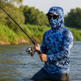 A blue camouflage fishing hoodie made of polyester and spandex, featuring a hood and fitted design, with a fishing rod.