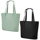 A mint green tote bag and a black tote bag, both featuring sturdy handles and a branding logo.
