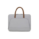 A grey laptop bag with a zippered outer pocket and brown PU handles, featuring a simple and sleek design.