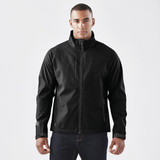 A black ultra-light shell jacket with a zip front and side pockets, featuring a logo on the sleeve.