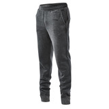 Men's fleece jogger pants in a dark grey colour with pockets and a waistband. Features branding on the fabric.