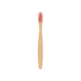 A small bamboo toothbrush with a pink bristle head and a smooth bamboo handle. It has a simple logo on the base.