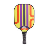 A vibrant pickleball paddle featuring a yellow, purple, and orange design, with a textured black handle and a logo.
