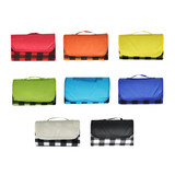 A collection of Pluto Picnic Blankets in various colours: red, yellow, green, blue, and black checkered designs.