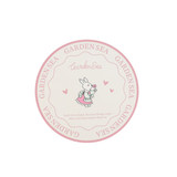 A round PU coaster featuring a pink and cream design with a cute bunny illustration and a logo.
