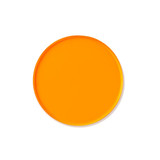 An orange custom tinted acrylic coaster with a smooth, round surface and a glossy finish.