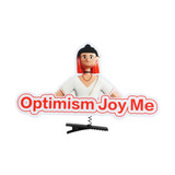 A custom felt hair clip featuring a character with red hair and the phrase "Optimism Joy Me" in bold text.