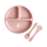 A pink silicone kids' suction plate divided into three sections, accompanied by a spoon and fork. The plate features a logo.