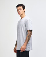 A unisex fine jersey short sleeve T-shirt in grey, featuring a fitted style and a logo on the front.