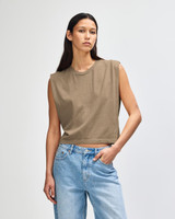A women's muscle t-shirt in a brown hue, featuring a sleeveless design and a relaxed fit.