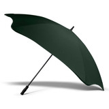A green BLUNT Sport Umbrella with a sleek design and a sturdy black handle. It features a logo on the shaft. A green BLUNT Sport Umbrella with a sleek design and a sturdy black handle. It features a logo on the shaft.