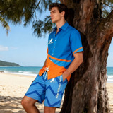Knee-length men's swim shorts in blue with an abstract pattern, paired with a matching blue and orange shirt.