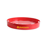 A red serving tray with a circular design and a branding logo inside. Suitable for home use.