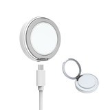 A magnetic wireless charging stand in silver and white, featuring a sleek design and a USB cable connection.