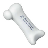 A white stress reliever shaped like a human bone with a rounded end. It features text in dark blue.