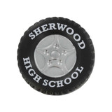 A black tire-shaped stress reliever featuring a silver wheel design and a logo.