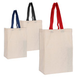 A set of three calico tote bags in cream, featuring navy, black, and red handles. Each bag has a logo. A set of three calico tote bags in cream, featuring navy, black, and red handles. Each bag has a logo.