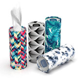 Four cylindrical containers of tissues featuring vibrant patterns, including geometric, floral, and leaf designs. Each has a logo.