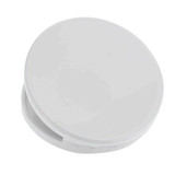 A round white fridge magnet clip with a smooth surface and a hinge for easy opening and closing.