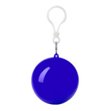 A blue wind poncho packed in a spherical case with a clip for easy attachment. Features a logo on the case.
