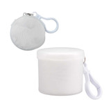 A compact white poncho in a carrying case with a clip. The case is round and smooth in texture.